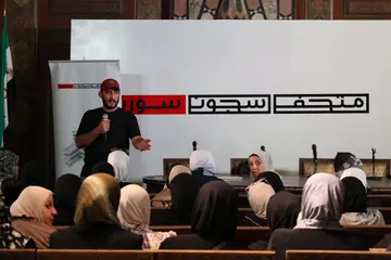 برنامج عام خلال إطلاق متحف سجون سوريا في دمشق